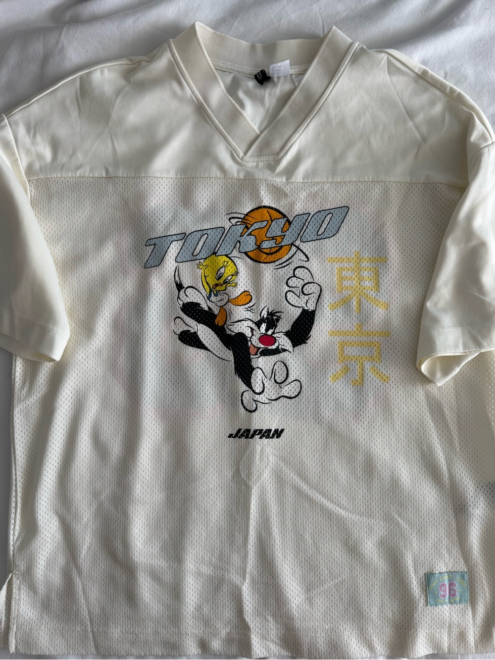 Warner Bros. Tokyo Graphic V-Neck Shirt - Cream, Yellow, Black